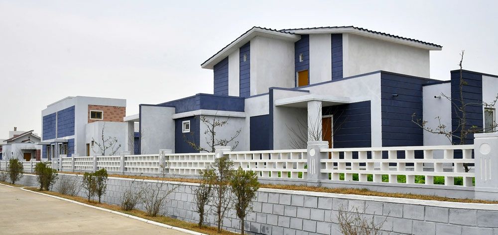 Moving into New Houses and Year-end Account Settlement and Income Distribution in Yokgudo Farm in DPRK - Image 5