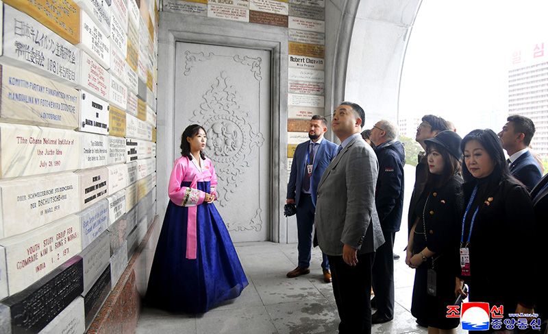 Delegation of Kim Il Sung - Kim Jong Il Foundation Conference visits Tower of Juche Idea - Image 4