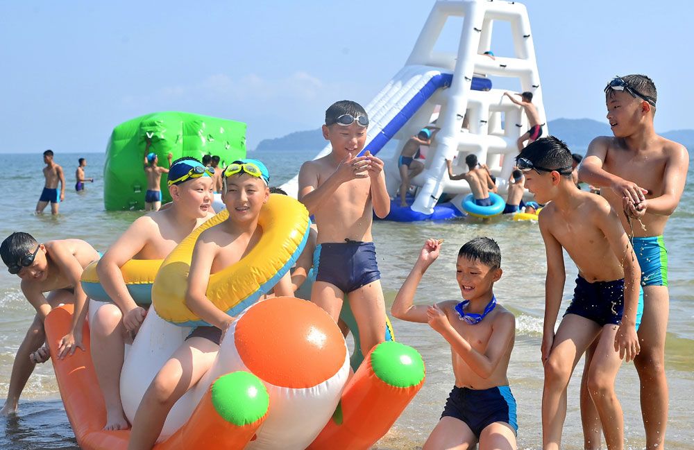 Students of Revolutionary Schools Spend Enjoyable Days in Wonsan Kalma Coastal Tourist Area - Image 6