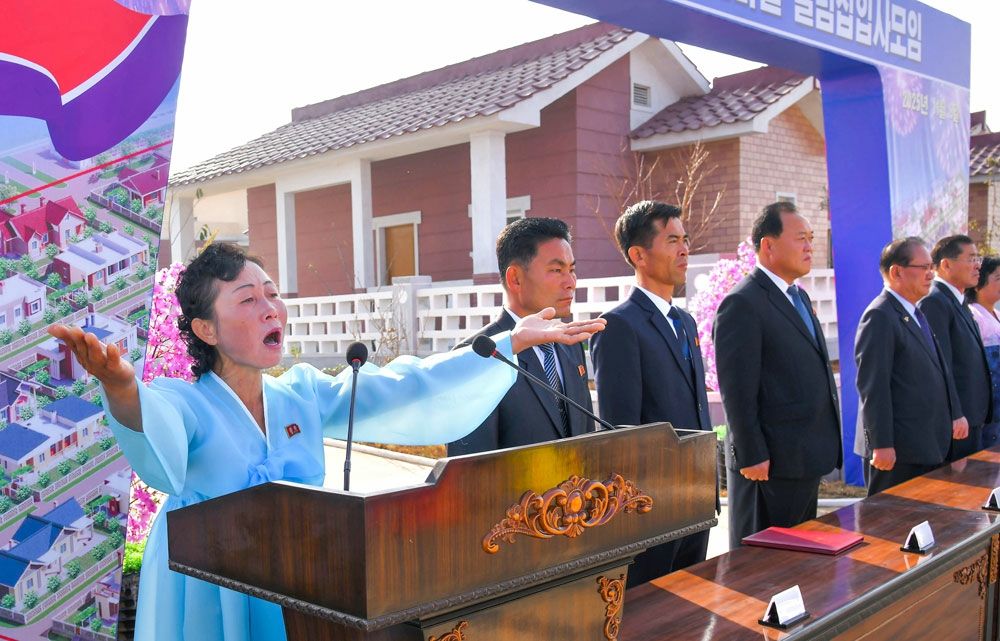 Moving into New Houses and Year-end Account Settlement and Income Distribution in Yokgudo Farm in DPRK