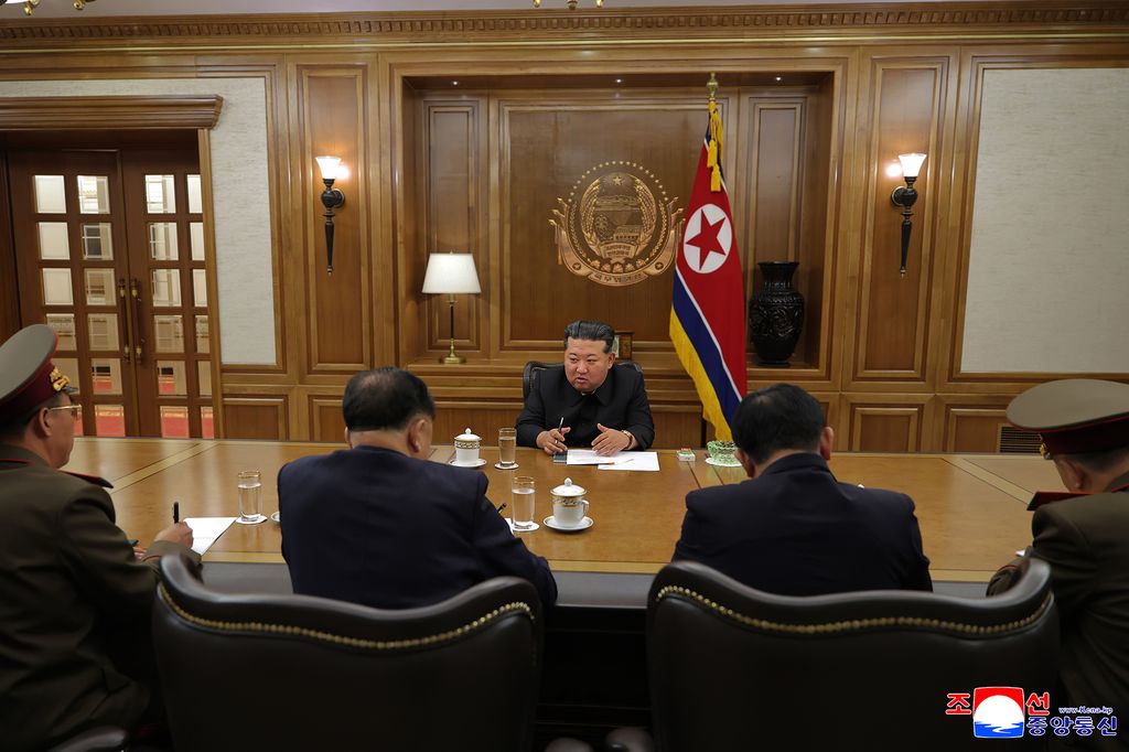 RespectedComrade Kim Jong Un meets scientists and technicians in nuclear field and guides important consultative meeting