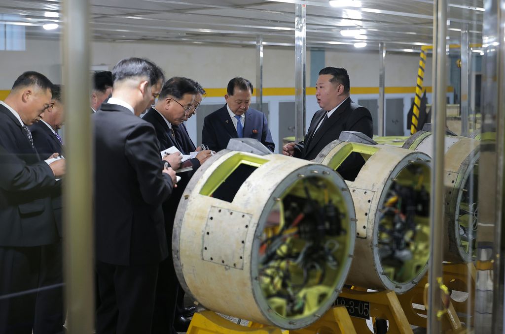 Respected Comrade Kim Jong Un Gives Field Guidance at Major Munitions Industry Enterprises - Image 5