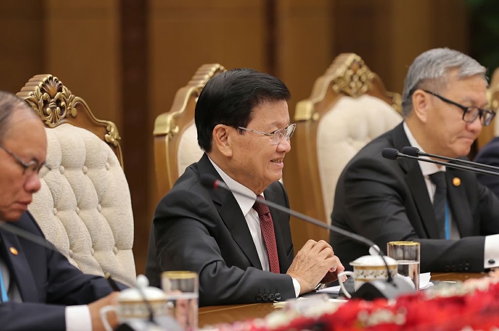 Respected Comrade Kim Jong Un Has Talks with Lao President - Image 3