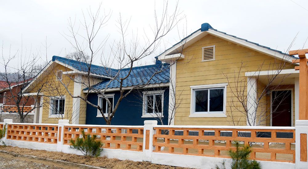 Agricultural Workers Move into New Houses in North Phyongan Province of DPRK - Image 13