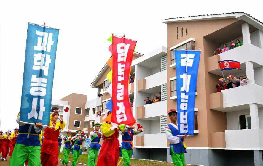 Agricultural Workers of Yombun Farm of Kyongsong County of North Hamgyong Province Move into New Houses - Image 2