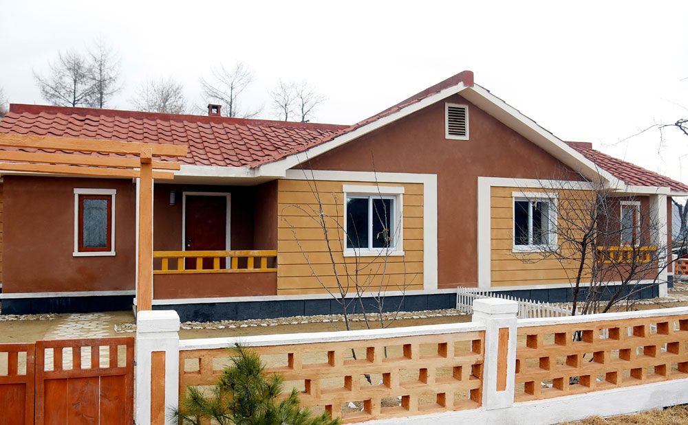 Agricultural Workers Move into New Houses in North Phyongan Province of DPRK - Image 15