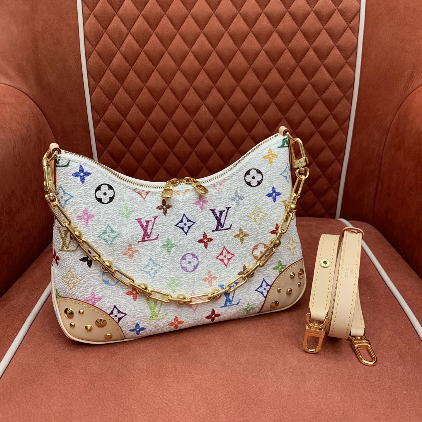The Louis Vuitton Boulogne PM features White Monogram Multicolore.