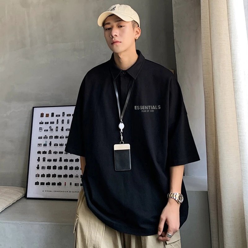 Fear of God (FOG) ESSENTIALS Fear of God ESSENTIALS Logo-Appliquéd Cotton-Blend Jersey Polo Shirts qc 1