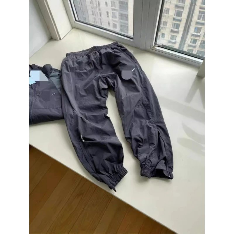 Nike x NOCTA Woven Track Pants qc 2