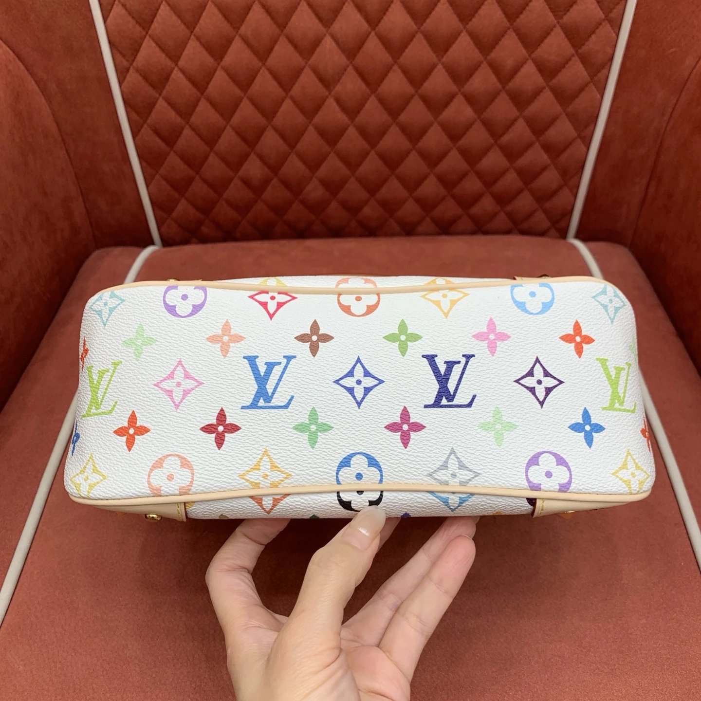 The Louis Vuitton Boulogne PM features White Monogram Multicolore. qc 4