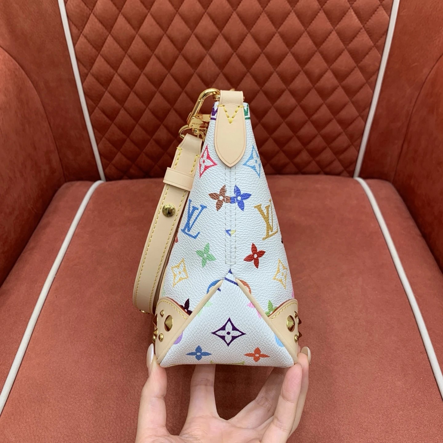 The Louis Vuitton Boulogne PM features White Monogram Multicolore. qc 3