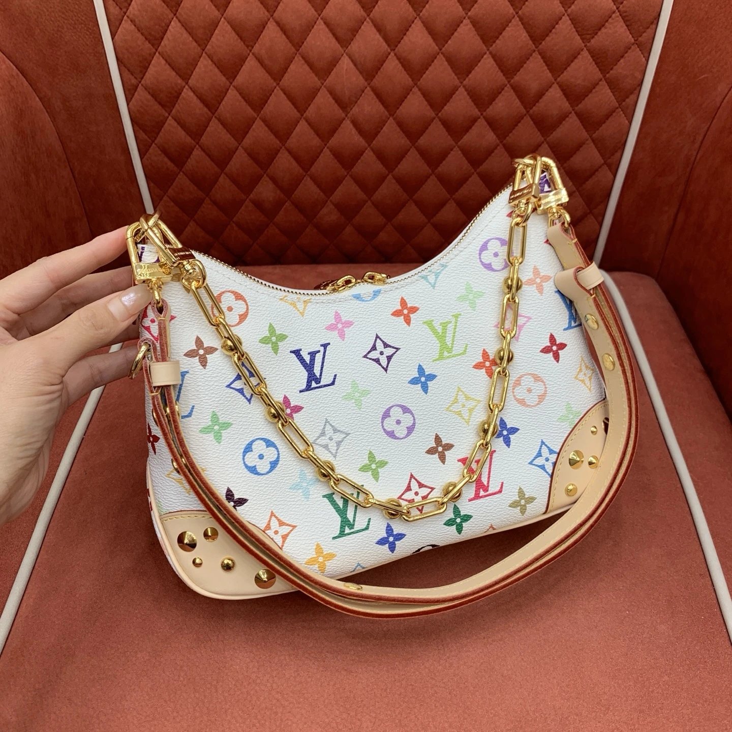 The Louis Vuitton Boulogne PM features White Monogram Multicolore. qc 2