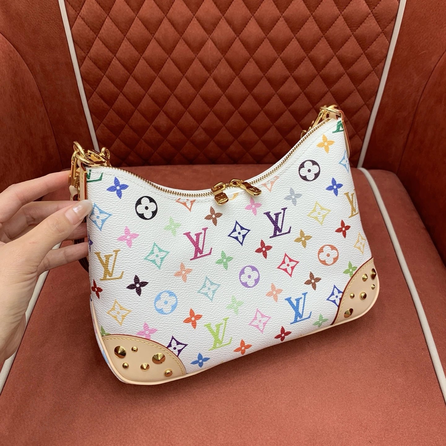 The Louis Vuitton Boulogne PM features White Monogram Multicolore. qc 1
