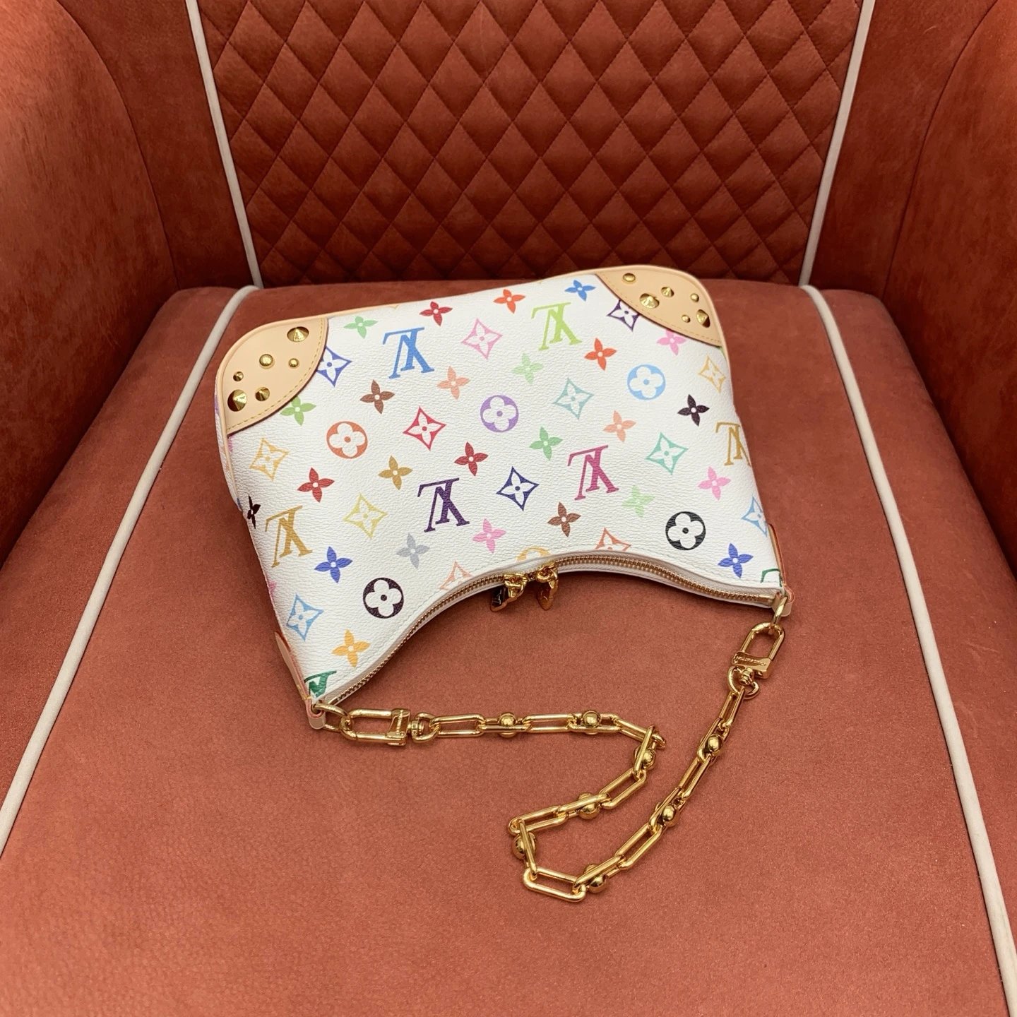 The Louis Vuitton Boulogne PM features White Monogram Multicolore. qc 5