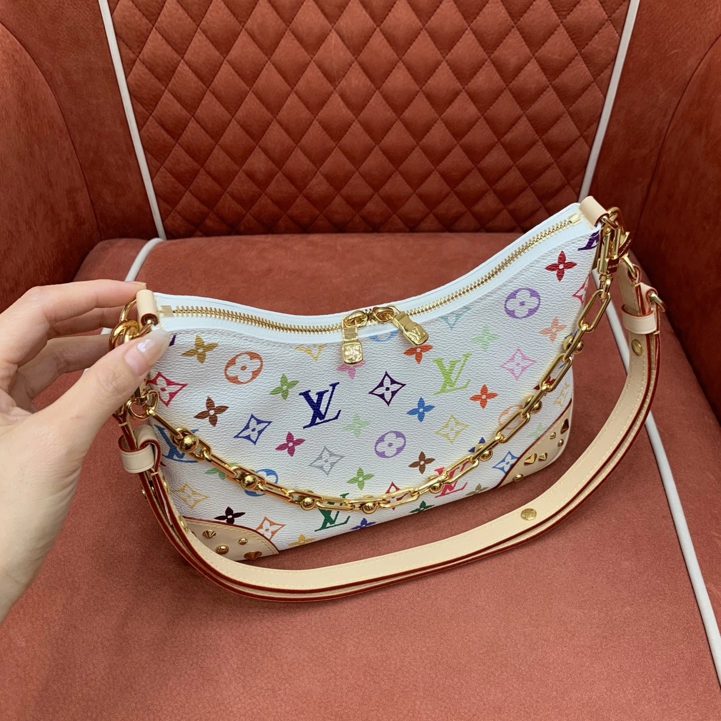 The Louis Vuitton Boulogne PM features White Monogram Multicolore. qc 8