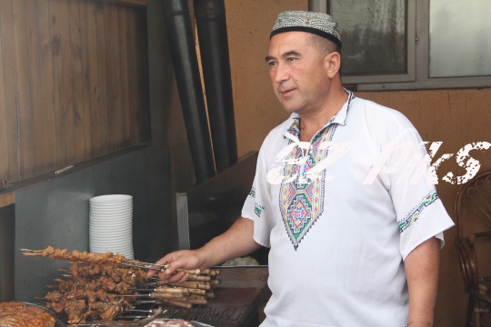 Xinjiang man at BBQ