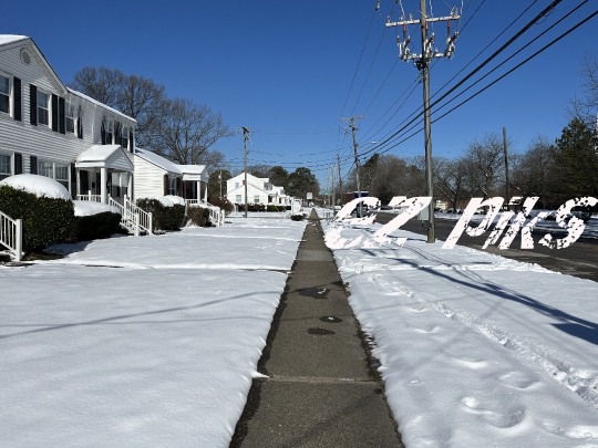 Snow Covered Sidewalk 