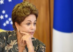 Brazilian President Dilma Rousseff gestures during signing of agreements South Korean President Park Geun-hye at the Planalto Palace in Brasilia, Brazil, on April 24, 2015. Park is on a 12-day South America tour, which also includes Colombia, Peru and Chile. AFP PHOTO/EVARISTO SA