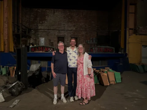 STANDING IN THE LIBERTY THEATER IN LEWISTON, IDAHO REMINISCING WITH FELLOW LIBER