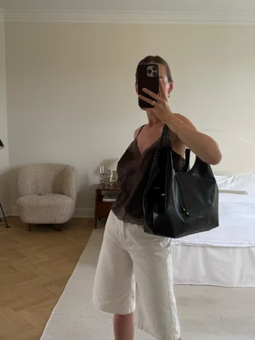 The it bag I’ve been wearing on repeat lately  @giannichiarini 🖤 advertising
