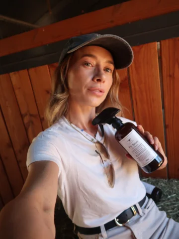 Here I am posing with fly spray because our horses deserve the best. When @nikki