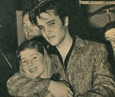 Backstage at The Ed Sullivan Show, October 28, 1956. Elvis shares a quiet moment