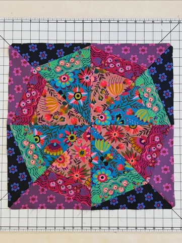 We have a quilt block mystery to solve, and I am willing to offer a reward!  In 