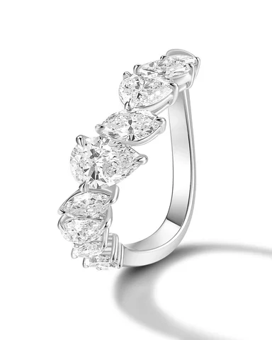 A wedding band should never be an afterthought. It should complete the ring—not 