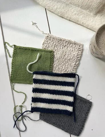 Swatching for spring + summer ➰ and something striped on the needles. I’ve spent