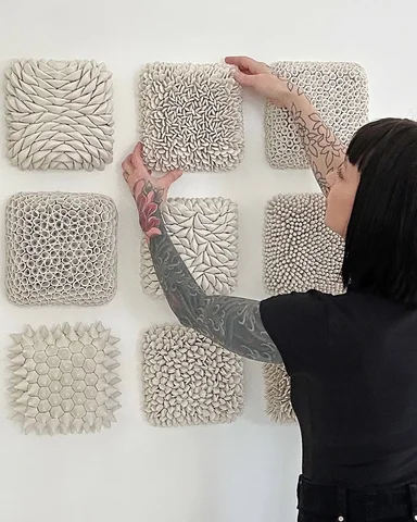 About the work.

My practice centers on sculptural ceramic wall installations an