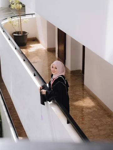 Graduated with elegance, a happy heart, and a degree I worked hard to pay for. L