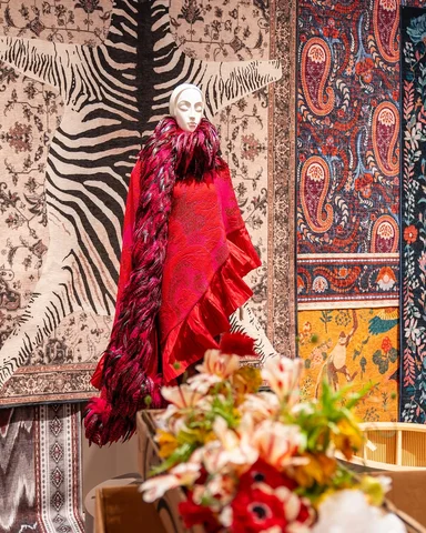 Bold eyewear, stacks of bangles, and patterns galore –– Iris Apfel’s singular co