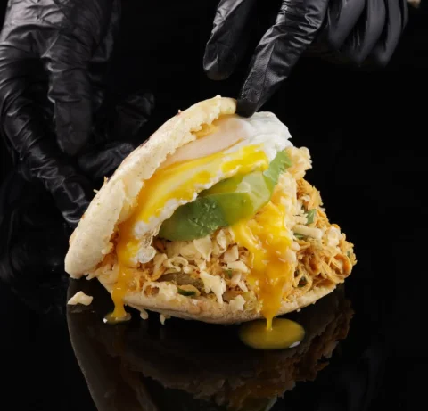 Arepa Super Catira (shredded Chicken, Gouda Cheese, Avocado and Egg) Come and en