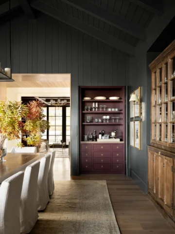 From the wallpapered vestibule to the charcoal mudroom, Willow Creek Estate refl