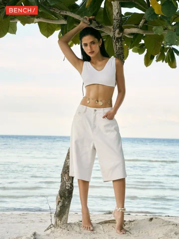 Nothing says summer like white by the water. This #BENCHSummer2026 look brings t