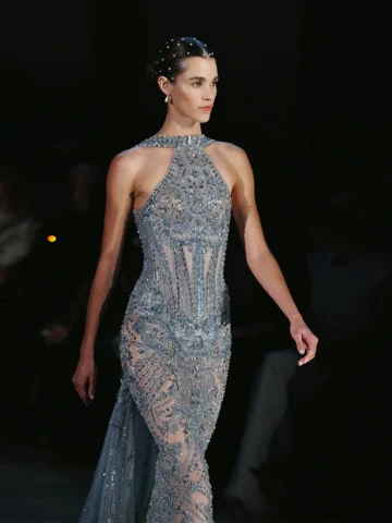 Unfolded across 45 silhouettes, the collection forms a procession of women movin