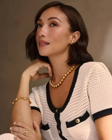Her Jewelmer pearls are always with her, a constant presence through every chang