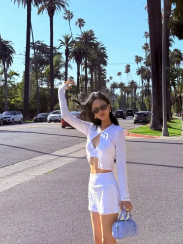 a little too attached to this city 😎 outfits @alo