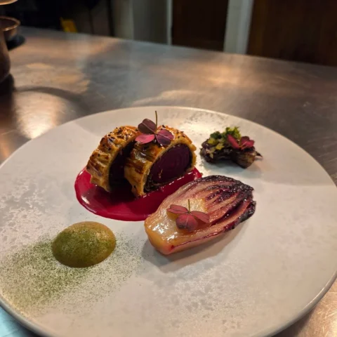 Crapaudine Beetroot welly. Farce made from duxelle and Coco beans, Smoked Beetro