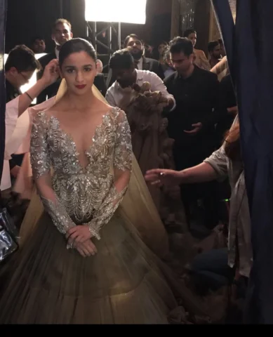 Throwback : Backstage Final Adjustments to Prior Fittings to Pinning of Garments