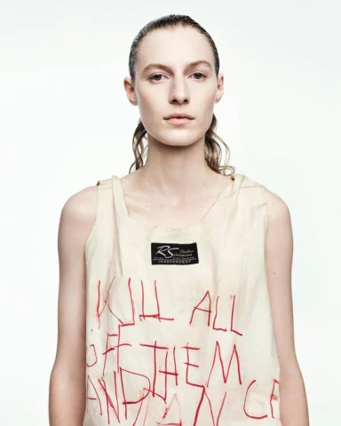 @juliaobis wearing RAF SIMONS’ final collection in the Spring/Summer 2023 issue 