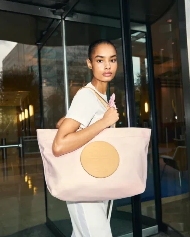 Our reversible Ella Twist tote, made from 100% recycled nylon and part of our To