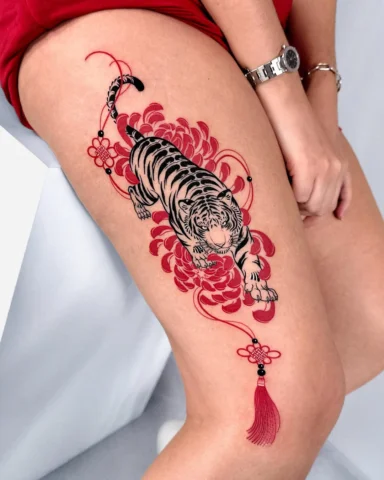 A black tiger surrounded by red chrysanthemums, complemented by traditional nori