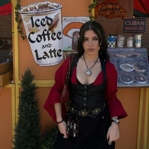 Just a renaissance witch with her historically accurate iced vanilla oat milk la