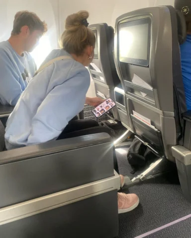 Target acquired. Engage. 

The nuclear family sat in the front two rows of my pl