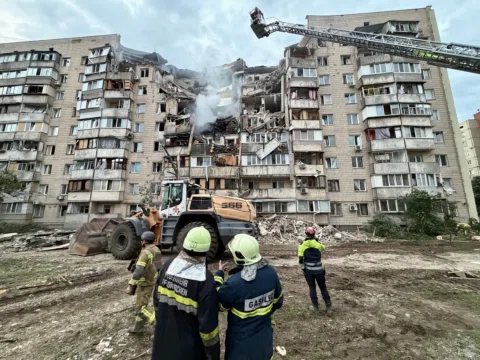A son. A mother. A father. Rescue workers are pulling an entire family from unde