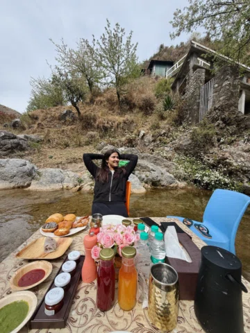 Piping hot food in the middle of a cold stream, impeccable in room dining, a pic