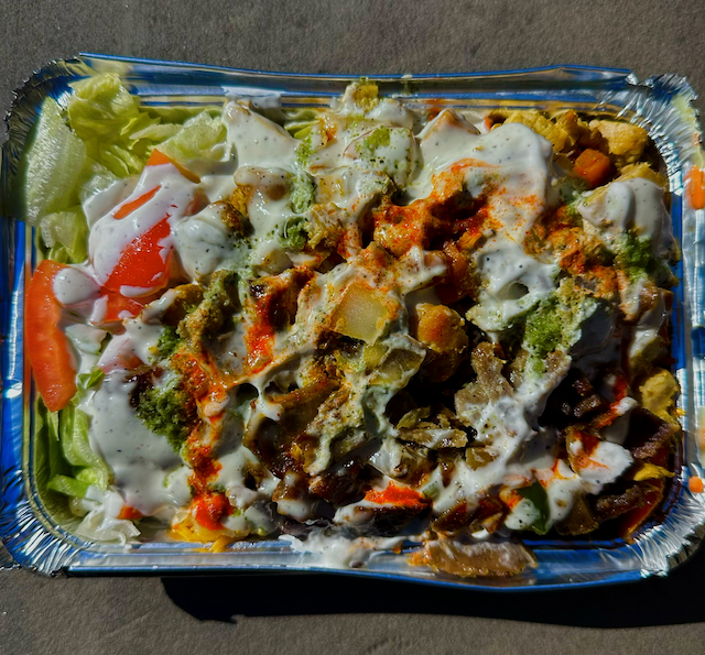 Photo of the food from above from the cart located at 83rd Street and 2nd Avenue