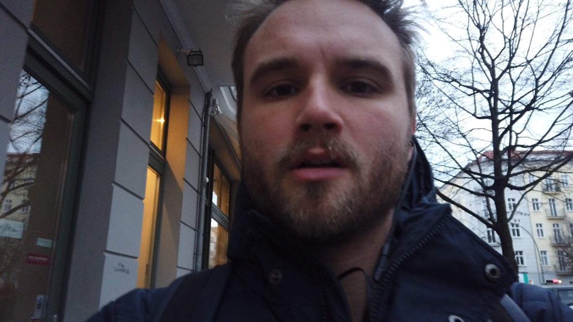 Man Taking Selfie Outside Building