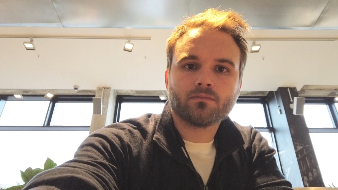 Man Taking Selfie in Modern Office